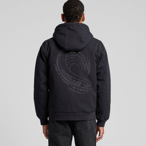 Person wearing a black hoodie with a logo on the back against a gray background