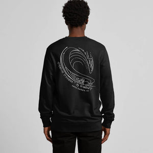 Person wearing a black sweatshirt with a white graphic design on the back against a gray background