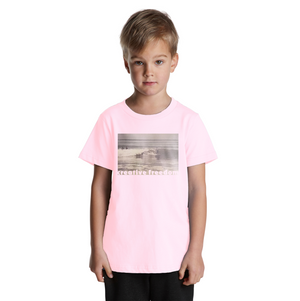 Child wearing a pink t-shirt with a graphic design on a white background